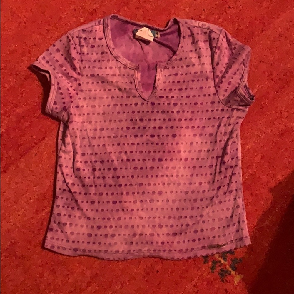 Trendy T-shirt with tie-dye and tears.
